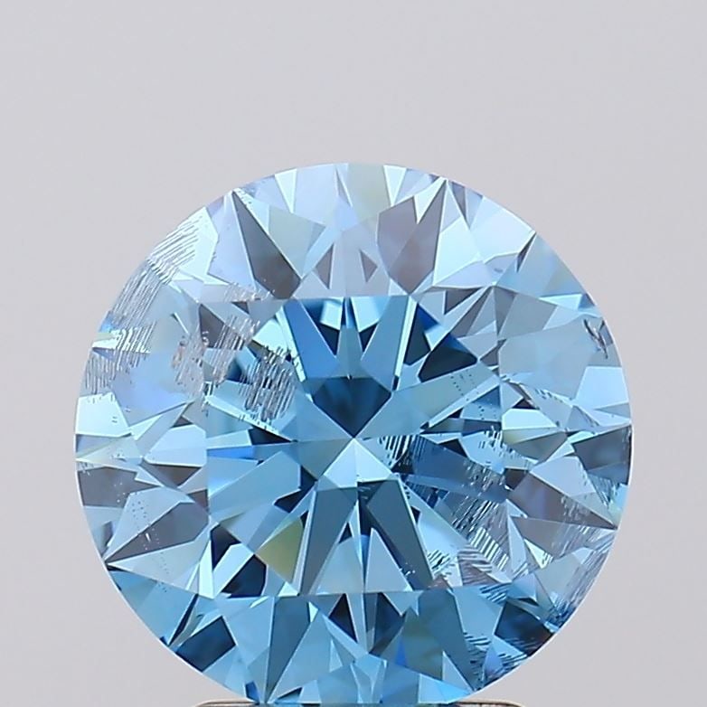 Ideal Loose Diamond - ROUND 3.04ct Fancy Vivid Blue SI2: Ideal Loose Diamond - ROUND 3.04ct Fancy Vivid Blue SI2 Source: This is a real non-mined Diamond that has been grown in a lab Shape: ROUND Carats: 3.04 Color: Fancy Vivid Blue Certification: IGI Video