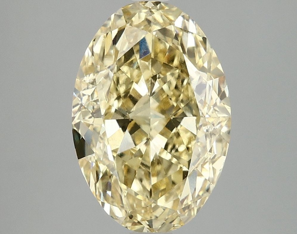 Loose Diamond - OVAL 4.02ct Fancy Vivid Yellow VS1: Loose Diamond - OVAL 4.02ct Fancy Vivid Yellow VS1 Source: This is a real non-mined Diamond that has been grown in a lab Shape: OVAL Carats: 4.02 Color: Fancy Vivid Yellow Certification: IGI Video: