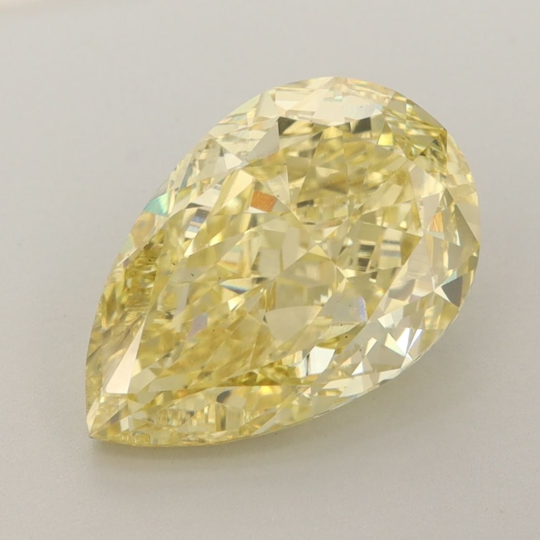 Loose Diamond - PEAR 4.81ct Fancy Vivid Yellow VS1: Loose Diamond - PEAR 4.81ct Fancy Vivid Yellow VS1 Source: This is a real non-mined Diamond that has been grown in a lab Shape: PEAR Carats: 4.81 Color: Fancy Vivid Yellow Certification: IGI Video: