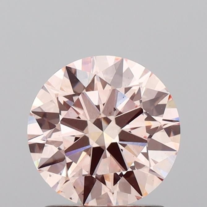 Ideal Loose Diamond - ROUND 1.85ct Fancy Pink VS2: Ideal Loose Diamond - ROUND 1.85ct Fancy Pink VS2 Source: This is a real non-mined Diamond that has been grown in a lab Shape: ROUND Carats: 1.85 Color: Fancy Pink Certification: IGI The Diamond Depot