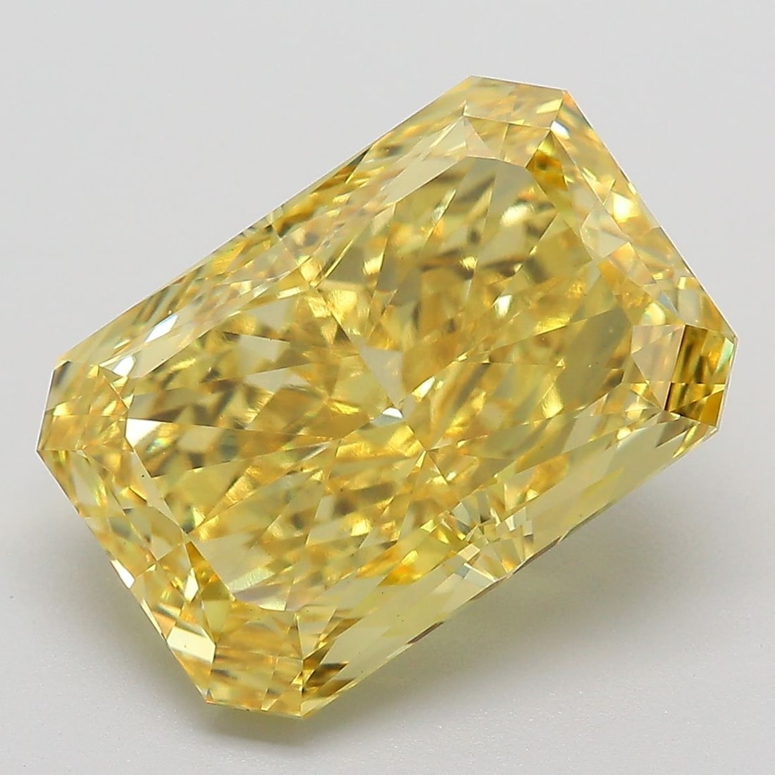 Loose Diamond - RADIANT 7.9ct Fancy Vivid Yellow VS1: Loose Diamond - RADIANT 7.9ct Fancy Vivid Yellow VS1 Source: This is a real non-mined Diamond that has been grown in a lab Shape: RADIANT Carats: 7.9 Color: Fancy Vivid Yellow Certification: IGI Video