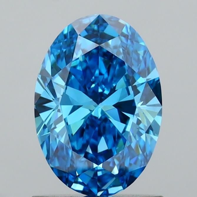 Loose Diamond - OVAL 1.01ct Fancy Vivid Blue VVS2: Loose Diamond - OVAL 1.01ct Fancy Vivid Blue VVS2 Source: This is a real non-mined Diamond that has been grown in a lab Shape: OVAL Carats: 1.01 Color: Fancy Vivid Blue Certification: IGI Video: