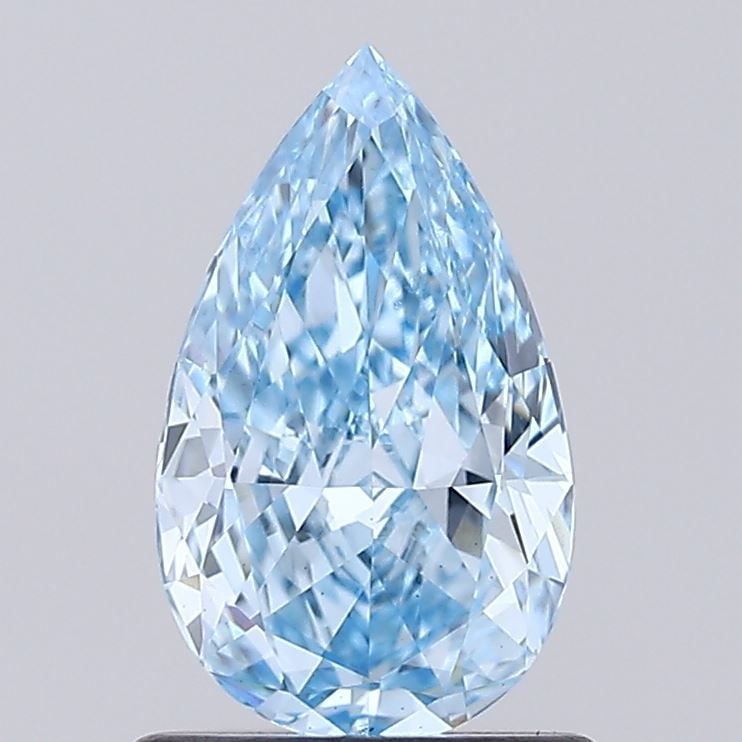 Loose Diamond - PEAR 0.91ct Fancy Vivid Blue VS1: Loose Diamond - PEAR 0.91ct Fancy Vivid Blue VS1 Source: This is a real non-mined Diamond that has been grown in a lab Shape: PEAR Carats: 0.91 Color: Fancy Vivid Blue Certification: IGI Video: