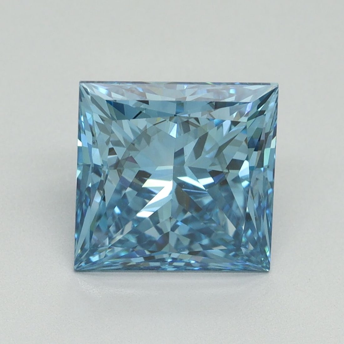 Loose Diamond - PRINCESS 4.06ct Fancy Vivid Blue VS2: Loose Diamond - PRINCESS 4.06ct Fancy Vivid Blue VS2 Source: This is a real non-mined Diamond that has been grown in a lab Shape: PRINCESS Carats: 4.06 Color: Fancy Vivid Blue Certification: IGI Video