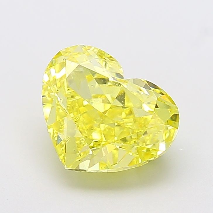 Loose Diamond - HEART 4.03ct Fancy Vivid Yellow VS2: Loose Diamond - HEART 4.03ct Fancy Vivid Yellow VS2 Source: This is a real non-mined Diamond that has been grown in a lab Shape: HEART Carats: 4.03 Color: Fancy Vivid Yellow Certification: IGI Video: