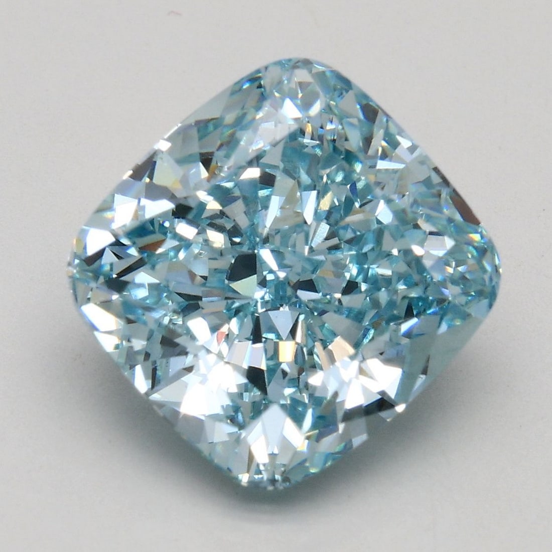 Loose Diamond - CUSHION BRILLIANT 4.05ct Fancy Intense Greenish Blue VS2: Loose Diamond - CUSHION BRILLIANT 4.05ct Fancy Intense Greenish Blue VS2 Source: This is a real non-mined Diamond that has been grown in a lab Shape: CUSHION BRILLIANT Carats: 4.05 Color: Fancy Intens