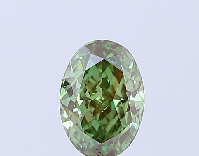 Loose Diamond - OVAL 1.0ct Fancy Vivid Green VS1: Loose Diamond - OVAL 1.0ct Fancy Vivid Green VS1 Source: This is a real non-mined Diamond that has been grown in a lab Shape: OVAL Carats: 1.0 Color: Fancy Vivid Green Certification: IGI Video: