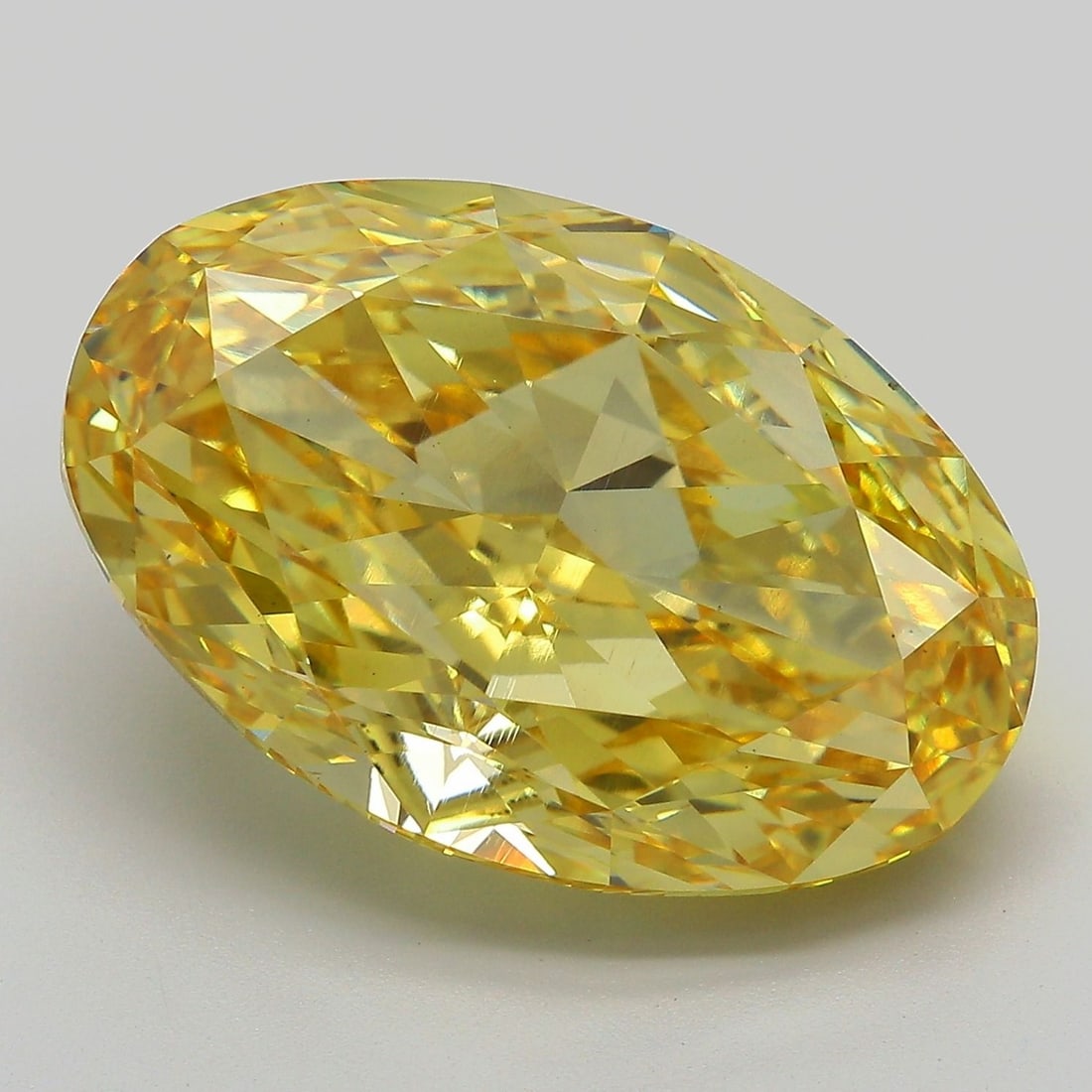 Loose Diamond - OVAL 17.16ct Fancy Vivid Yellow VS1: Loose Diamond - OVAL 17.16ct Fancy Vivid Yellow VS1 Source: This is a real non-mined Diamond that has been grown in a lab Shape: OVAL Carats: 17.16 Color: Fancy Vivid Yellow Certification: IGI Video: