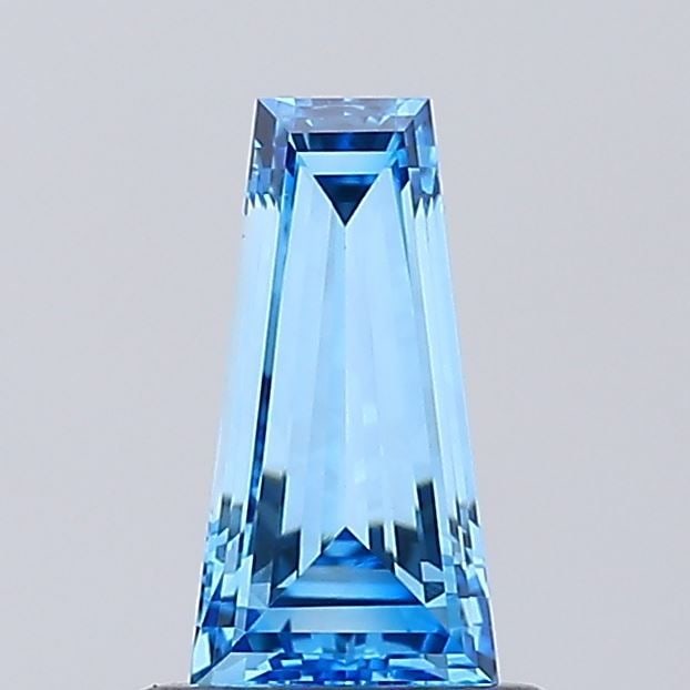 Loose Diamond - TAPERED BAGUETTE 0.8ct Fancy Vivid Blue VVS1: Loose Diamond - TAPERED BAGUETTE 0.8ct Fancy Vivid Blue VVS1 Source: This is a real non-mined Diamond that has been grown in a lab Shape: TAPERED BAGUETTE Carats: 0.8 Color: Fancy Vivid Blue Certifica