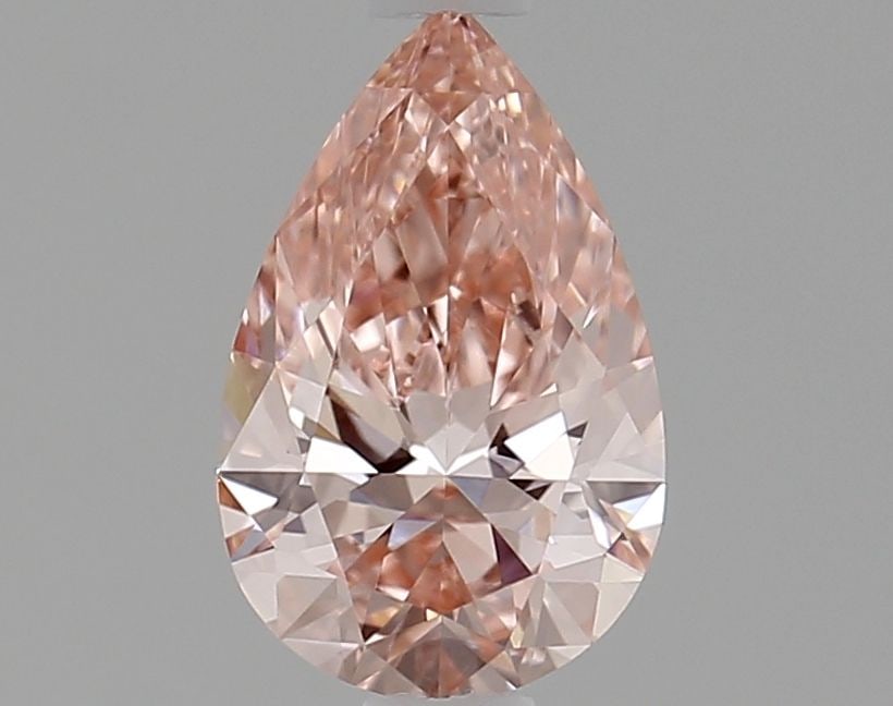 Loose Diamond - PEAR 0.72ct Fancy Vivid Pink VVS1: Loose Diamond - PEAR 0.72ct Fancy Vivid Pink VVS1 Source: This is a real non-mined Diamond that has been grown in a lab Shape: PEAR Carats: 0.72 Color: Fancy Vivid Pink Certification: IGI Video: