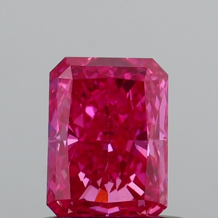 Loose Diamond - RADIANT 0.66ct Fancy Vivid Pink VS2: Loose Diamond - RADIANT 0.66ct Fancy Vivid Pink VS2 Source: This is a real non-mined Diamond that has been grown in a lab Shape: RADIANT Carats: 0.66 Color: Fancy Vivid Pink Certification: IGI Video: