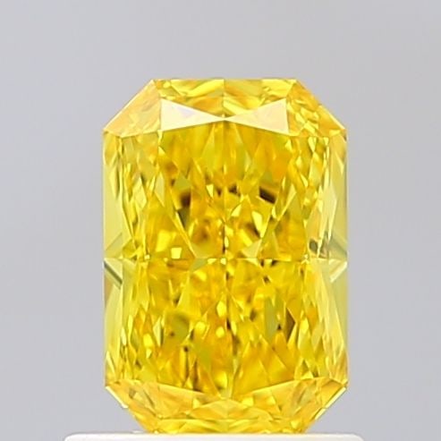Loose Diamond - RADIANT 1.04ct Fancy Vivid Yellow VS1: Loose Diamond - RADIANT 1.04ct Fancy Vivid Yellow VS1 Source: This is a real non-mined Diamond that has been grown in a lab Shape: RADIANT Carats: 1.04 Color: Fancy Vivid Yellow Certification: IGI Vid