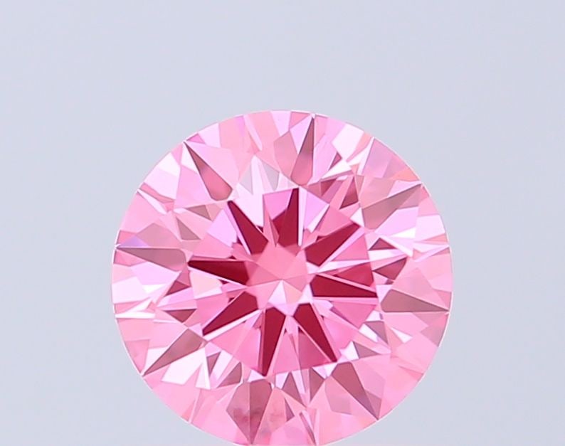 Ideal Loose Diamond - ROUND 1.01ct Fancy Vivid Pink VVS2: Ideal Loose Diamond - ROUND 1.01ct Fancy Vivid Pink VVS2 Source: This is a real non-mined Diamond that has been grown in a lab Shape: ROUND Carats: 1.01 Color: Fancy Vivid Pink Certification: IGI Vide