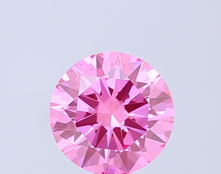 Loose Diamond - ROUND 1.01ct Fancy Vivid Pink VS1: Loose Diamond - ROUND 1.01ct Fancy Vivid Pink VS1 Source: This is a real non-mined Diamond that has been grown in a lab Shape: ROUND Carats: 1.01 Color: Fancy Vivid Pink Certification: IGI Video: