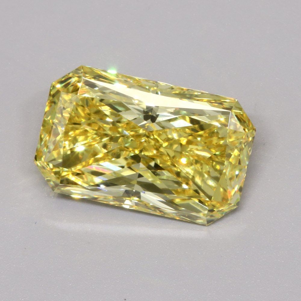 Loose Diamond - RADIANT 4.51ct Fancy Vivid Yellow VS1: Loose Diamond - RADIANT 4.51ct Fancy Vivid Yellow VS1 Source: This is a real non-mined Diamond that has been grown in a lab Shape: RADIANT Carats: 4.51 Color: Fancy Vivid Yellow Certification: IGI Vid