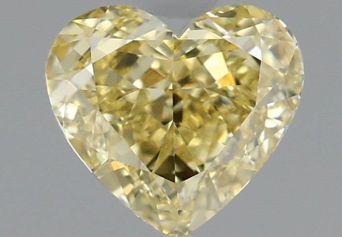 Loose Diamond - HEART 1.51ct Fancy Intense Yellow VVS2: Loose Diamond - HEART 1.51ct Fancy Intense Yellow VVS2 Source: This is a real non-mined Diamond that has been grown in a lab Shape: HEART Carats: 1.51 Color: Fancy Intense Yellow Certification: IGI Vi