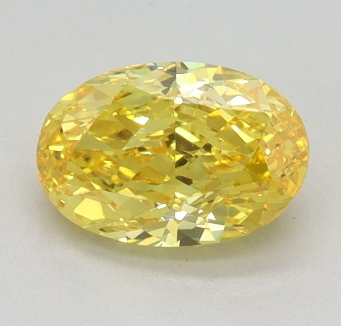 Loose Diamond - OVAL 0.71ct Fancy Vivid Yellow VS1: Loose Diamond - OVAL 0.71ct Fancy Vivid Yellow VS1 Source: This is a real non-mined Diamond that has been grown in a lab Shape: OVAL Carats: 0.71 Color: Fancy Vivid Yellow Certification: IGI Video:
