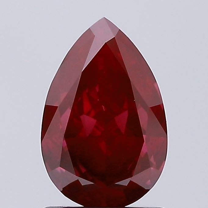Loose Diamond - PEAR 1.35ct Fancy Vivid Red VS1: Loose Diamond - PEAR 1.35ct Fancy Vivid Red VS1 Source: This is a real non-mined Diamond that has been grown in a lab Shape: PEAR Carats: 1.35 Color: Fancy Vivid Red Certification: NONE Video: