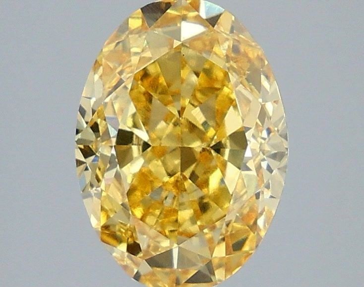 Loose Diamond - OVAL 3.03ct Fancy Vivid Yellow VS1: Loose Diamond - OVAL 3.03ct Fancy Vivid Yellow VS1 Source: This is a real non-mined Diamond that has been grown in a lab Shape: OVAL Carats: 3.03 Color: Fancy Vivid Yellow Certification: IGI Video: