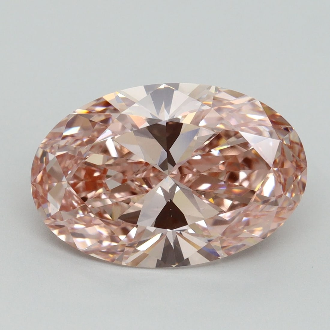 Loose Diamond - OVAL 6.03ct Fancy Vivid Pink VS1: Loose Diamond - OVAL 6.03ct Fancy Vivid Pink VS1 Source: This is a real non-mined Diamond that has been grown in a lab Shape: OVAL Carats: 6.03 Color: Fancy Vivid Pink Certification: IGI Video: