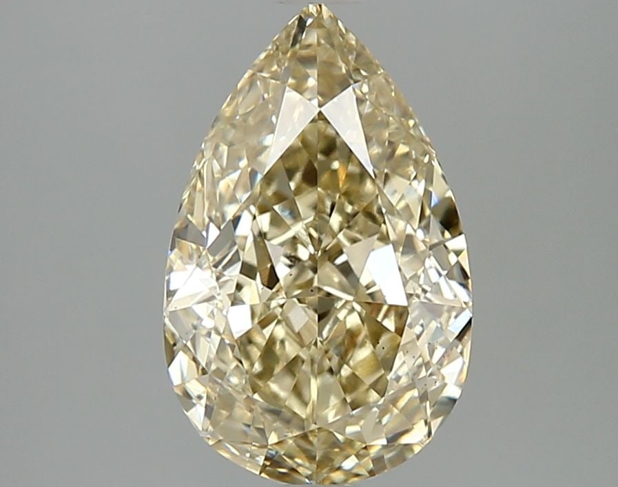 Loose Diamond - PEAR 3.0ct Fancy Yellow VS2: Loose Diamond - PEAR 3.0ct Fancy Yellow VS2 Source: This is a real non-mined Diamond that has been grown in a lab Shape: PEAR Carats: 3.0 Color: Fancy Yellow Certification: IGI Video: