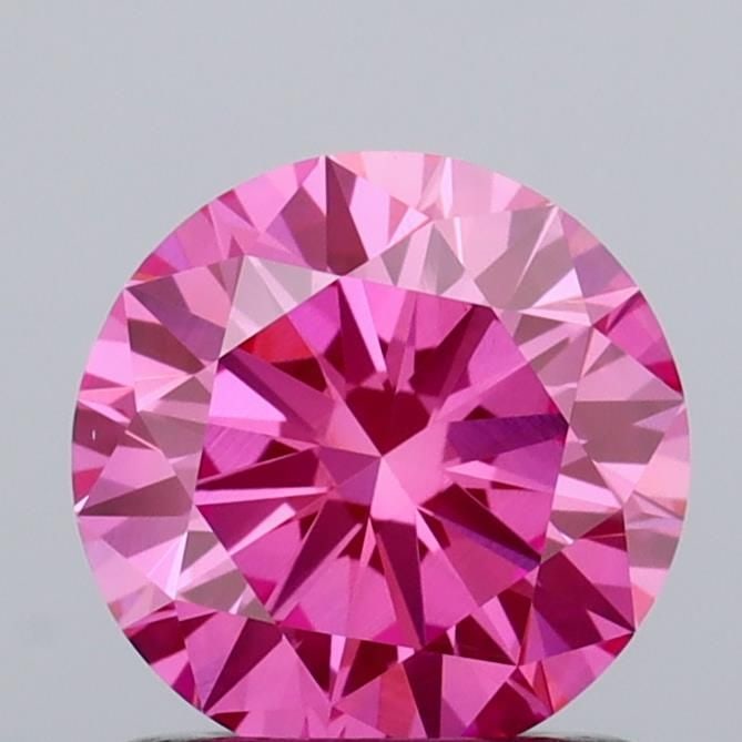Loose Diamond - ROUND 1.0ct Fancy Vivid Pink VS1: Loose Diamond - ROUND 1.0ct Fancy Vivid Pink VS1 Source: This is a real non-mined Diamond that has been grown in a lab Shape: ROUND Carats: 1.0 Color: Fancy Vivid Pink Certification: IGI Video:
