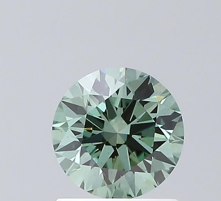 Ideal Loose Diamond - ROUND 1.02ct Fancy Vivid Green VS1: Ideal Loose Diamond - ROUND 1.02ct Fancy Vivid Green VS1 Source: This is a real non-mined Diamond that has been grown in a lab Shape: ROUND Carats: 1.02 Color: Fancy Vivid Green Certification: IGI Vid
