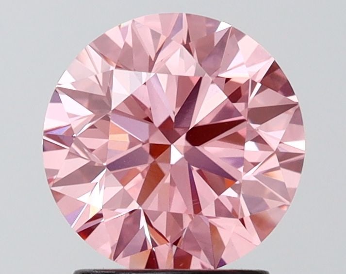 Loose Diamond - ROUND 2.0ct Fancy Vivid Pink VS1: Loose Diamond - ROUND 2.0ct Fancy Vivid Pink VS1 Source: This is a real non-mined Diamond that has been grown in a lab Shape: ROUND Carats: 2.0 Color: Fancy Vivid Pink Certification: IGI Video: