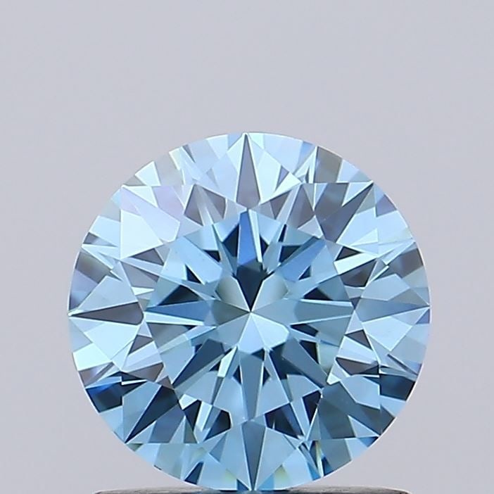 Ideal Loose Diamond - ROUND 1.04ct Fancy Vivid Blue VVS2: Ideal Loose Diamond - ROUND 1.04ct Fancy Vivid Blue VVS2 Source: This is a real non-mined Diamond that has been grown in a lab Shape: ROUND Carats: 1.04 Color: Fancy Vivid Blue Certification: IGI Vide