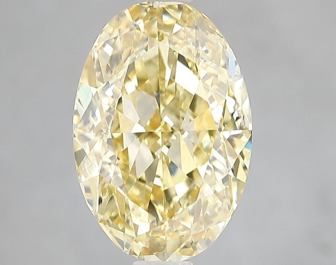 Loose Diamond - OVAL 4.02ct Fancy Vivid Yellow VS2: Loose Diamond - OVAL 4.02ct Fancy Vivid Yellow VS2 Source: This is a real non-mined Diamond that has been grown in a lab Shape: OVAL Carats: 4.02 Color: Fancy Vivid Yellow Certification: IGI Video: