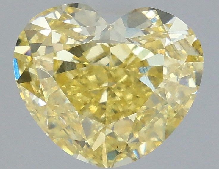 Loose Diamond - HEART 2.56ct Fancy Vivid Yellow VS1: Loose Diamond - HEART 2.56ct Fancy Vivid Yellow VS1 Source: This is a real non-mined Diamond that has been grown in a lab Shape: HEART Carats: 2.56 Color: Fancy Vivid Yellow Certification: IGI Video: