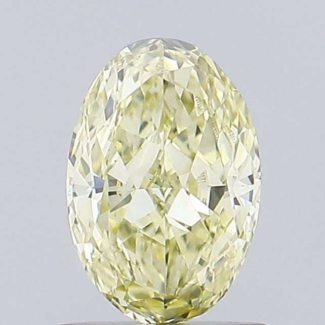 Loose Diamond - OVAL 0.81ct Fancy Yellow VVS2: Loose Diamond - OVAL 0.81ct Fancy Yellow VVS2 Source: This is a real non-mined Diamond that has been grown in a lab Shape: OVAL Carats: 0.81 Color: Fancy Yellow Certification: IGI Video: