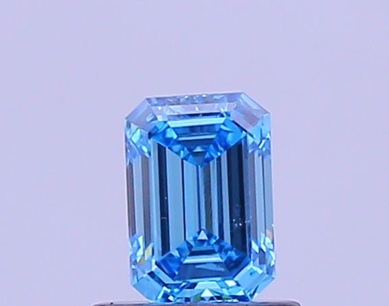 Loose Diamond - EMERALD 0.61ct Fancy Vivid Blue VVS2: Loose Diamond - EMERALD 0.61ct Fancy Vivid Blue VVS2 Source: This is a real non-mined Diamond that has been grown in a lab Shape: EMERALD Carats: 0.61 Color: Fancy Vivid Blue Certification: IGI Video: