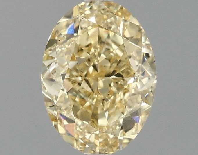 Loose Diamond - OVAL 1.52ct Fancy Vivid Yellow VS2: Loose Diamond - OVAL 1.52ct Fancy Vivid Yellow VS2 Source: This is a real non-mined Diamond that has been grown in a lab Shape: OVAL Carats: 1.52 Color: Fancy Vivid Yellow Certification: IGI Video: