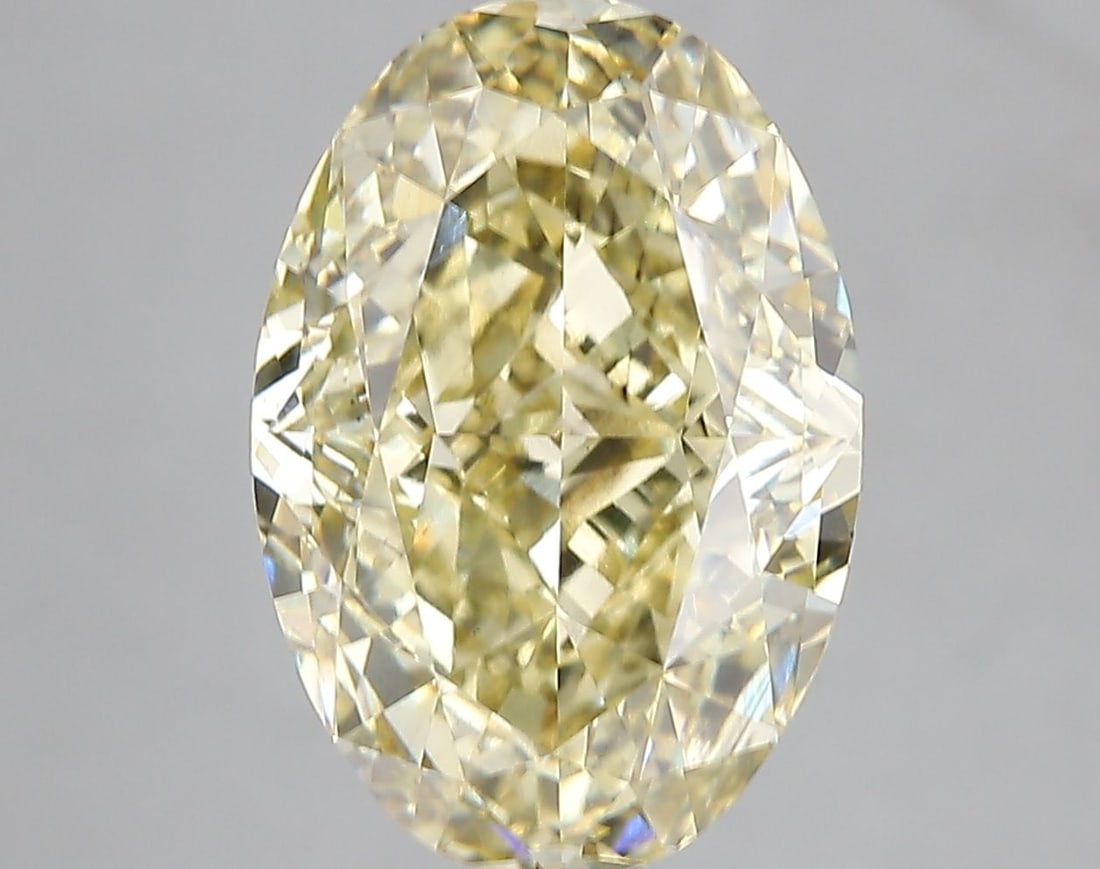 Loose Diamond - OVAL 6.58ct Fancy Intense Yellow VS2: Loose Diamond - OVAL 6.58ct Fancy Intense Yellow VS2 Source: This is a real non-mined Diamond that has been grown in a lab Shape: OVAL Carats: 6.58 Color: Fancy Intense Yellow Certification: IGI Video