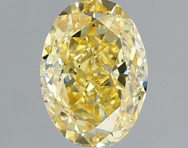 Loose Diamond - OVAL 1.1ct Fancy Vivid Yellow VS2: Loose Diamond - OVAL 1.1ct Fancy Vivid Yellow VS2 Source: This is a real non-mined Diamond that has been grown in a lab Shape: OVAL Carats: 1.1 Color: Fancy Vivid Yellow Certification: IGI Video: