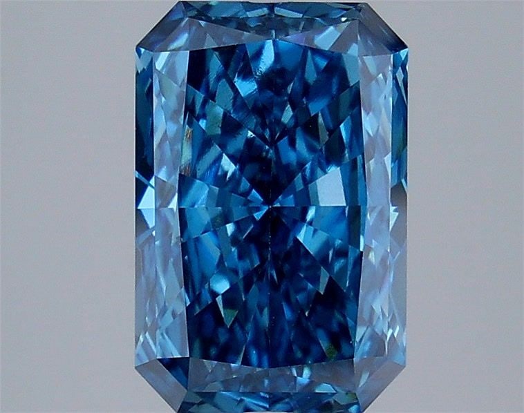 Loose Diamond - RADIANT 3.14ct Fancy Vivid Blue VS2: Loose Diamond - RADIANT 3.14ct Fancy Vivid Blue VS2 Source: This is a real non-mined Diamond that has been grown in a lab Shape: RADIANT Carats: 3.14 Color: Fancy Vivid Blue Certification: IGI Video: