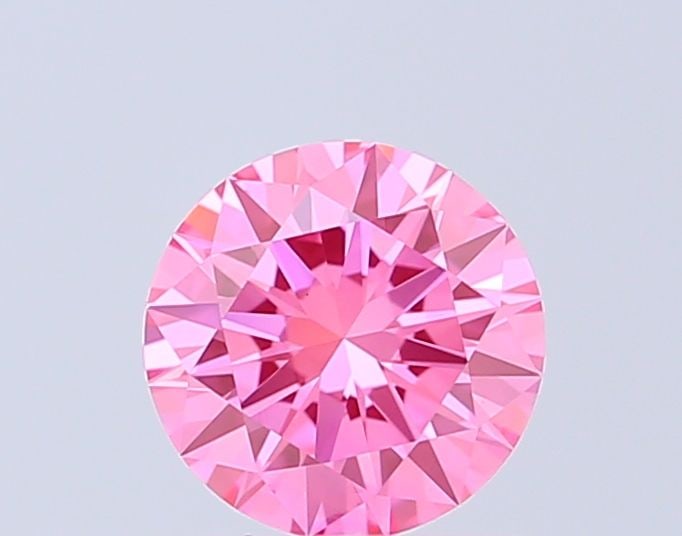 Loose Diamond - ROUND 0.87ct Fancy Vivid Pink VS1: Loose Diamond - ROUND 0.87ct Fancy Vivid Pink VS1 Source: This is a real non-mined Diamond that has been grown in a lab Shape: ROUND Carats: 0.87 Color: Fancy Vivid Pink Certification: IGI Video: