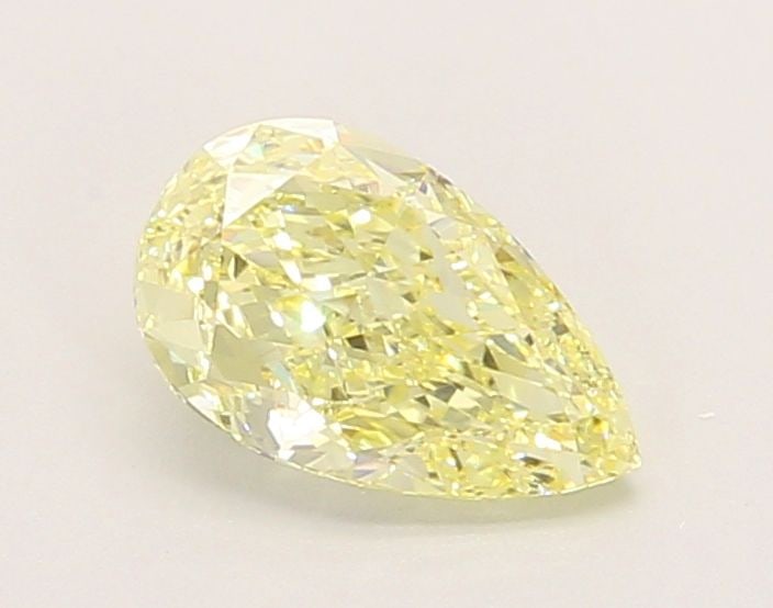 Loose Diamond - PEAR 0.99ct Fancy Intense Yellow VVS2: Loose Diamond - PEAR 0.99ct Fancy Intense Yellow VVS2 Source: This is a real non-mined Diamond that has been grown in a lab Shape: PEAR Carats: 0.99 Color: Fancy Intense Yellow Certification: IGI Vide