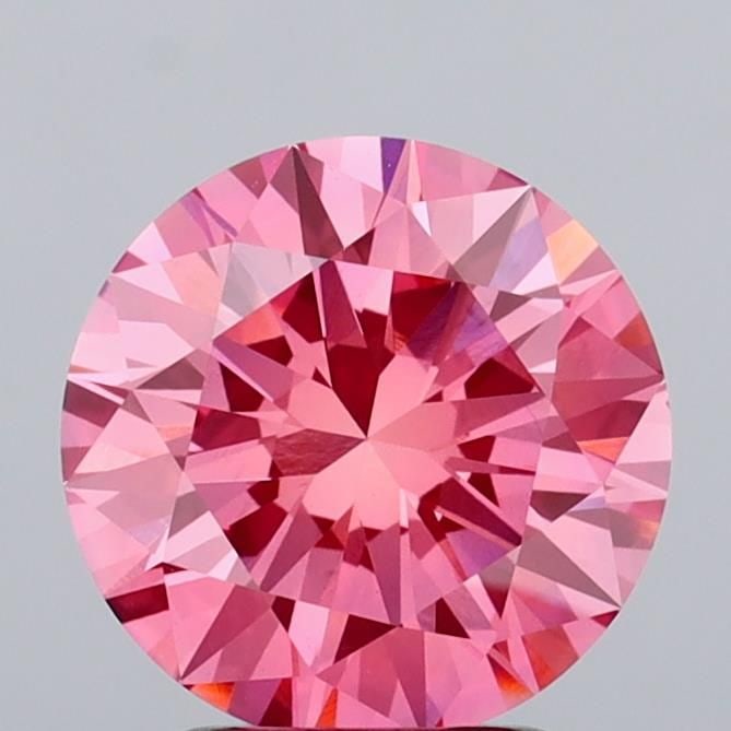 Loose Diamond - ROUND 2.5ct Fancy Vivid Pink VS1: Loose Diamond - ROUND 2.5ct Fancy Vivid Pink VS1 Source: This is a real non-mined Diamond that has been grown in a lab Shape: ROUND Carats: 2.5 Color: Fancy Vivid Pink Certification: IGI Video: