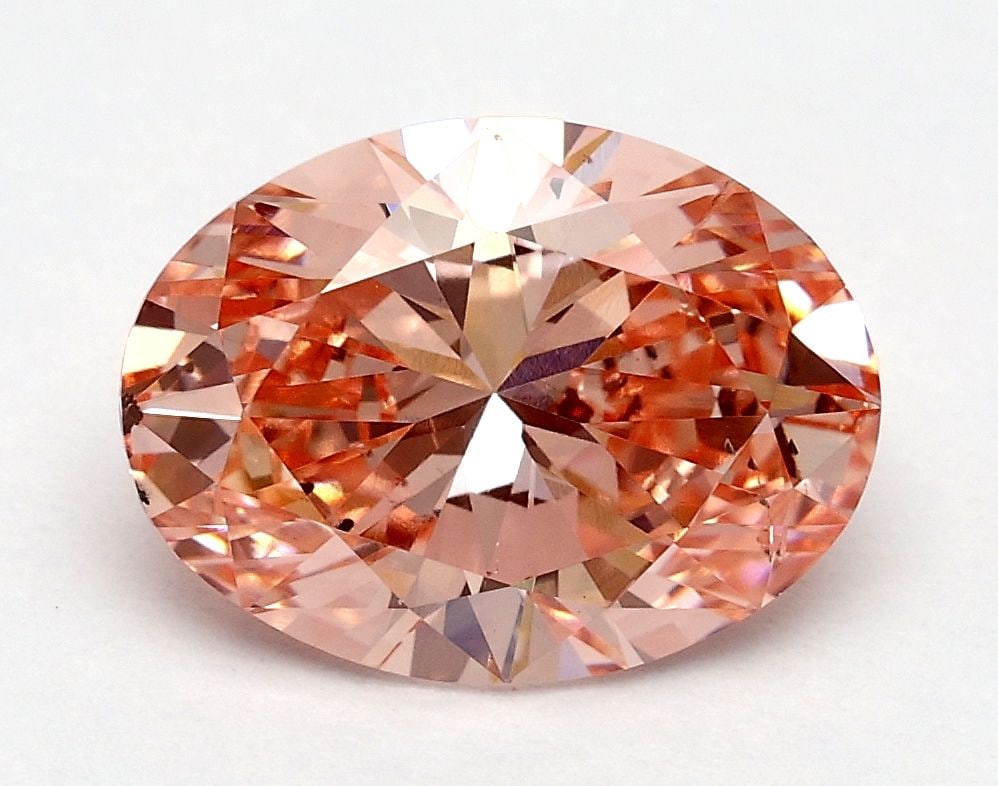 Loose Diamond - OVAL 1.7ct Fancy Vivid Pink SI1: Loose Diamond - OVAL 1.7ct Fancy Vivid Pink SI1 Source: This is a real non-mined Diamond that has been grown in a lab Shape: OVAL Carats: 1.7 Color: Fancy Vivid Pink Certification: IGI Video: