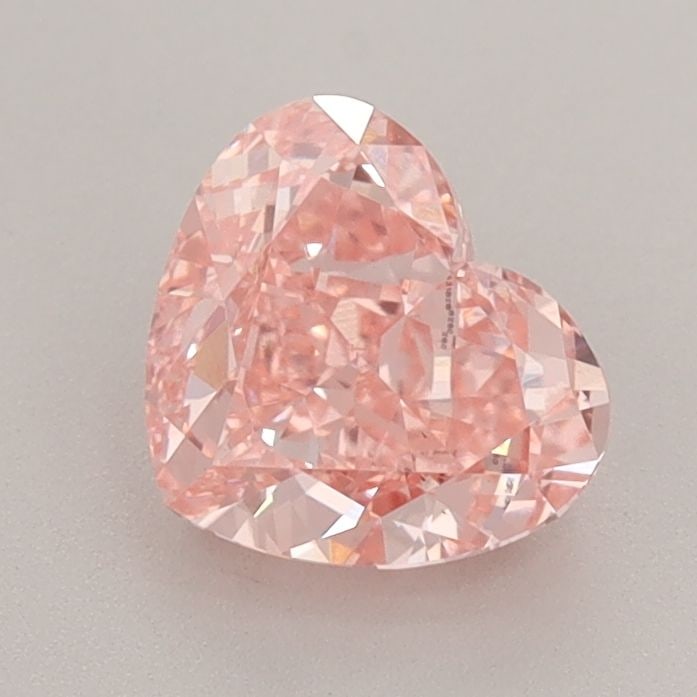 Loose Diamond - HEART 1.38ct Fancy Vivid Pink VS1: Loose Diamond - HEART 1.38ct Fancy Vivid Pink VS1 Source: This is a real non-mined Diamond that has been grown in a lab Shape: HEART Carats: 1.38 Color: Fancy Vivid Pink Certification: IGI Video: