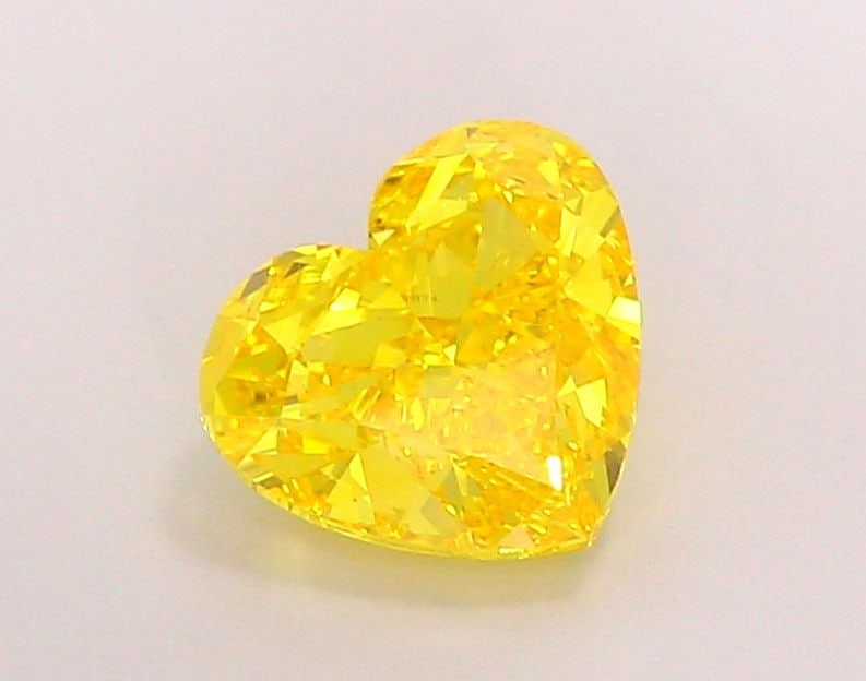 Loose Diamond - HEART 2.52ct Fancy Vivid Yellow VS1: Loose Diamond - HEART 2.52ct Fancy Vivid Yellow VS1 Source: This is a real non-mined Diamond that has been grown in a lab Shape: HEART Carats: 2.52 Color: Fancy Vivid Yellow Certification: IGI Video: