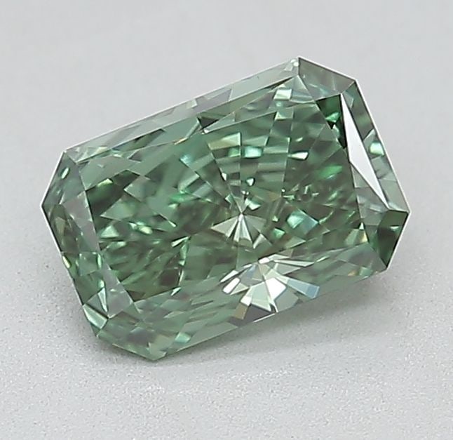 Loose Diamond - RADIANT 0.89ct Fancy Vivid Green VS2: Loose Diamond - RADIANT 0.89ct Fancy Vivid Green VS2 Source: This is a real non-mined Diamond that has been grown in a lab Shape: RADIANT Carats: 0.89 Color: Fancy Vivid Green Certification: IGI The D