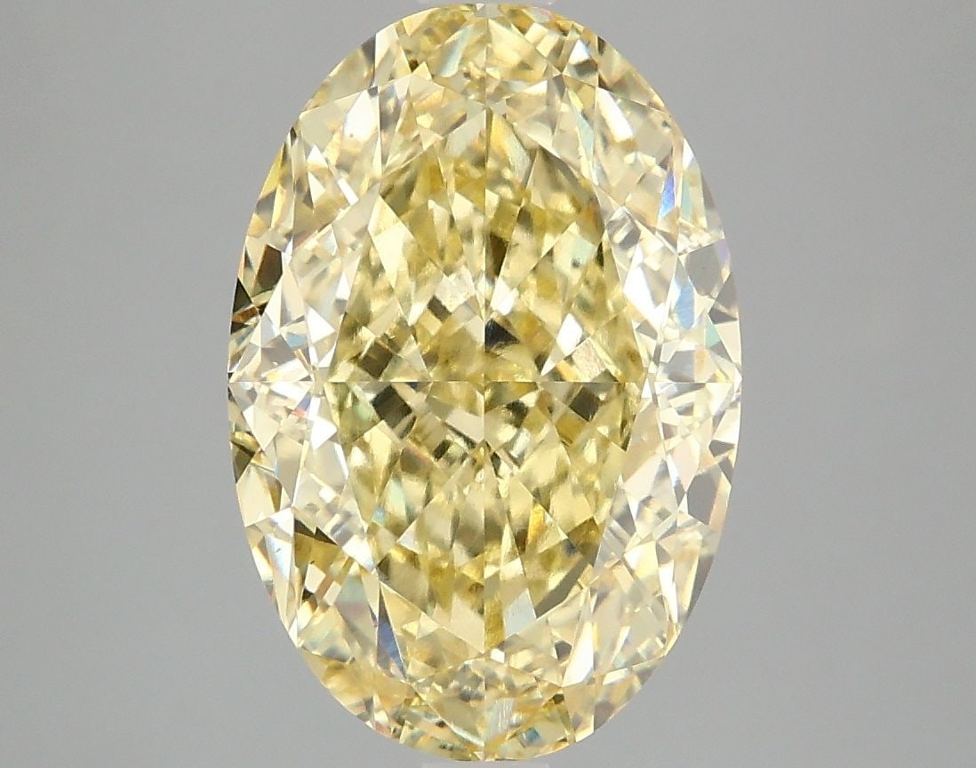 Loose Diamond - OVAL 4.91ct Fancy Vivid Yellow VS1: Loose Diamond - OVAL 4.91ct Fancy Vivid Yellow VS1 Source: This is a real non-mined Diamond that has been grown in a lab Shape: OVAL Carats: 4.91 Color: Fancy Vivid Yellow Certification: IGI Video: