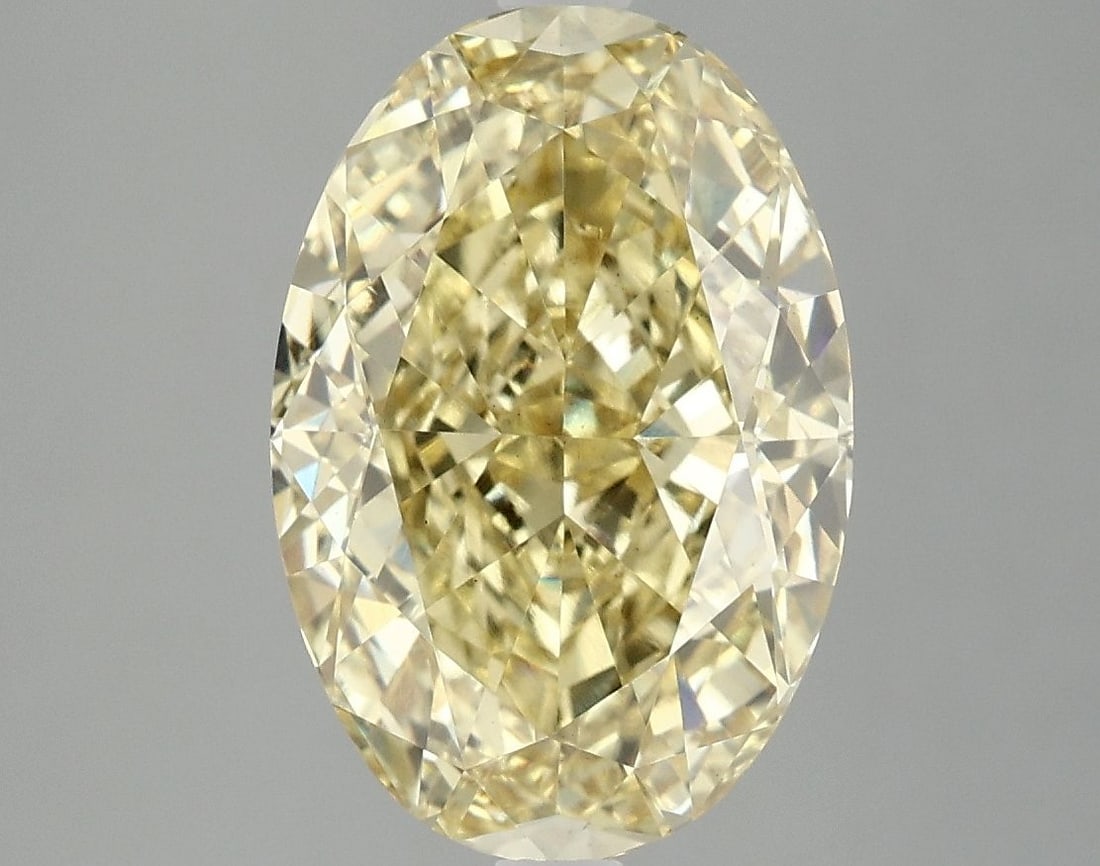 Loose Diamond - OVAL 5.03ct Fancy Vivid Yellow VS2: Loose Diamond - OVAL 5.03ct Fancy Vivid Yellow VS2 Source: This is a real non-mined Diamond that has been grown in a lab Shape: OVAL Carats: 5.03 Color: Fancy Vivid Yellow Certification: IGI Video: