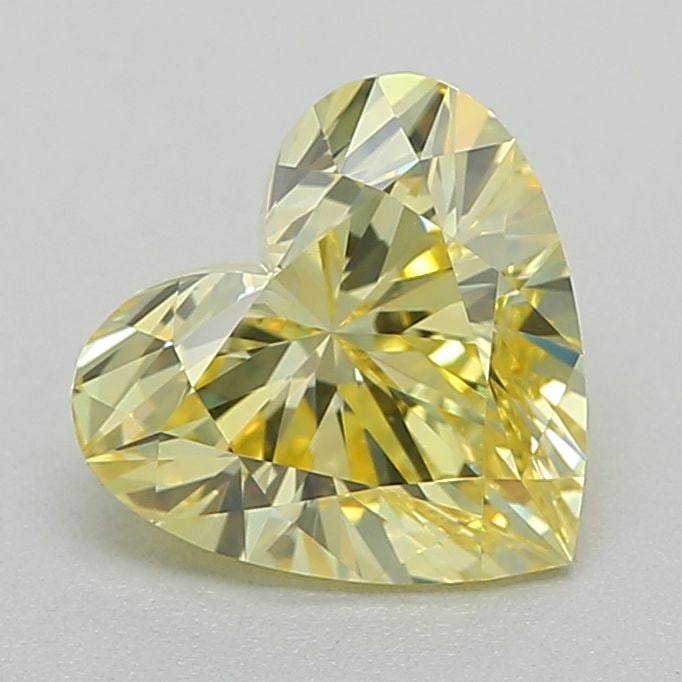 Loose Diamond - HEART 0.72ct Fancy Vivid Yellow VVS1: Loose Diamond - HEART 0.72ct Fancy Vivid Yellow VVS1 Source: This is a real non-mined Diamond that has been grown in a lab Shape: HEART Carats: 0.72 Color: Fancy Vivid Yellow Certification: IGI Video: