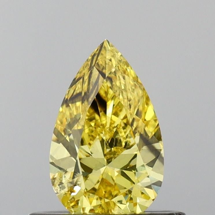 Loose Diamond - PEAR 0.49ct Fancy Vivid Yellow SI1: Loose Diamond - PEAR 0.49ct Fancy Vivid Yellow SI1 Source: This is a real non-mined Diamond that has been grown in a lab Shape: PEAR Carats: 0.49 Color: Fancy Vivid Yellow Certification: IGI Video:
