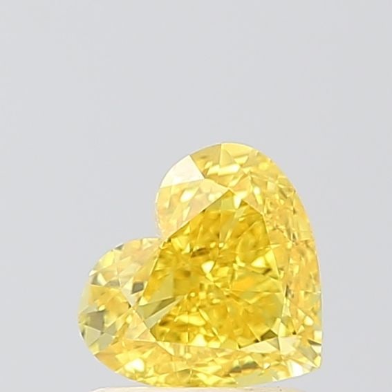 Loose Diamond - HEART 1.06ct Fancy Vivid Yellow VVS2: Loose Diamond - HEART 1.06ct Fancy Vivid Yellow VVS2 Source: This is a real non-mined Diamond that has been grown in a lab Shape: HEART Carats: 1.06 Color: Fancy Vivid Yellow Certification: IGI Video:
