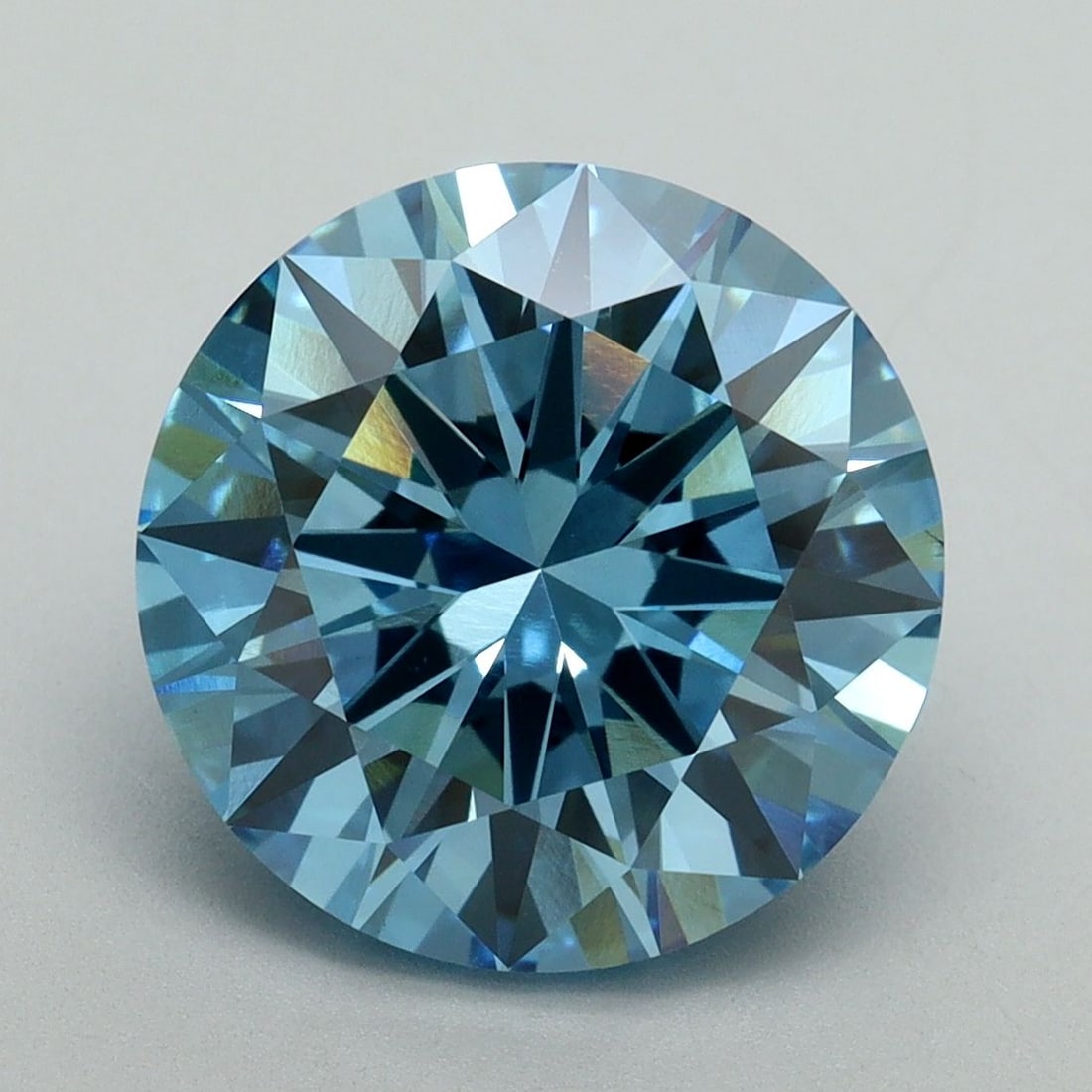 Loose Diamond - ROUND 5.02ct Fancy Vivid Blue VS1: Loose Diamond - ROUND 5.02ct Fancy Vivid Blue VS1 Source: This is a real non-mined Diamond that has been grown in a lab Shape: ROUND Carats: 5.02 Color: Fancy Vivid Blue Certification: IGI Video: